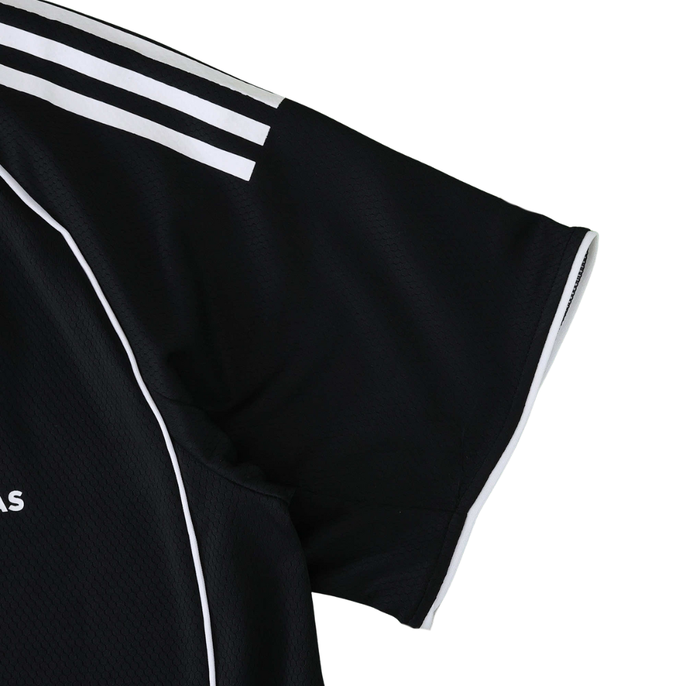 Black motorsport racing jersey with white stripes and mesh fabric from revnhaus