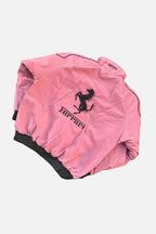 Pink Ferrari racing jacket with black prancing horse logo and trim, from revnhaus