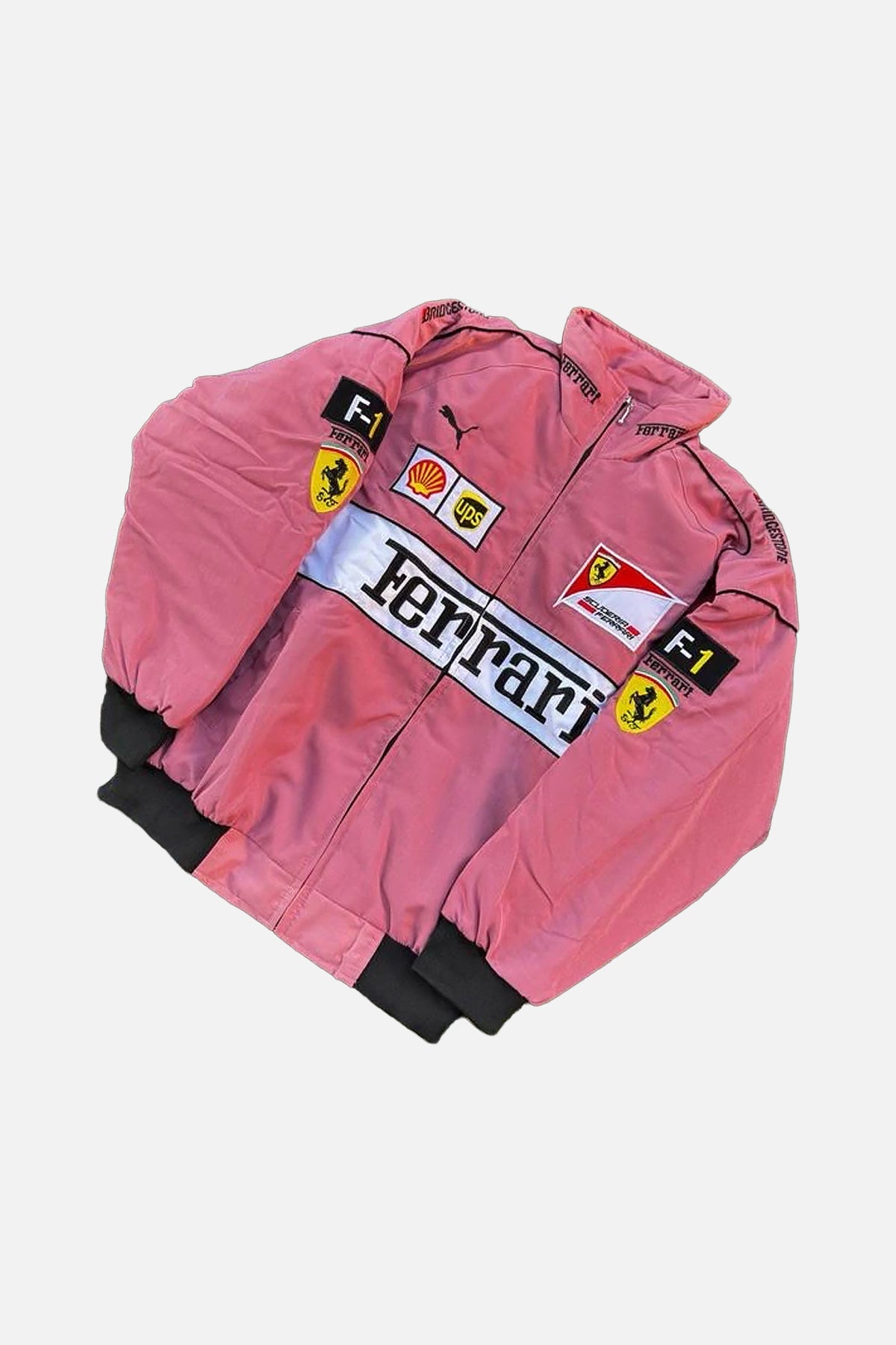 Pink Ferrari F1 racing jacket with Shell, UPS, and Puma logos from revnhaus