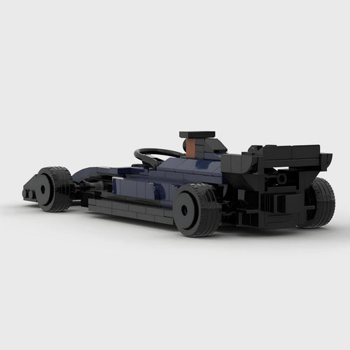 Blue and black LEGO-style F1 race car model with detailed chassis and tires from revnhaus
