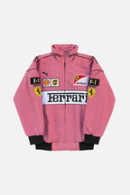 Pink Ferrari F1 racing jacket with Shell, UPS, and Puma logos from revnhaus