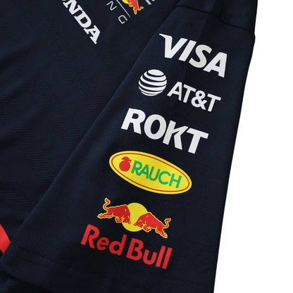 Red Bull Racing F1 team jacket sleeve with sponsor logos including Visa, AT&T, ROKT, Rauch from revnhaus