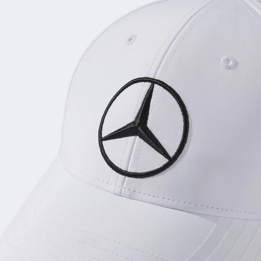 White Mercedes-Benz logo cap with black embroidery, motorsport apparel from revnhaus