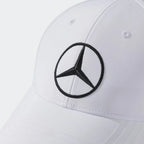 White Mercedes-Benz logo cap with black embroidery, motorsport apparel from revnhaus