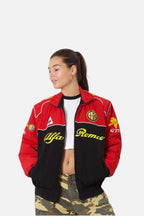Red and black Alfa Romeo racing jacket with embroidered logos, worn by woman in camo pants from revnhaus