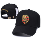 Black Porsche baseball cap with embroidered crest and gold logo, motorsport apparel from revnhaus