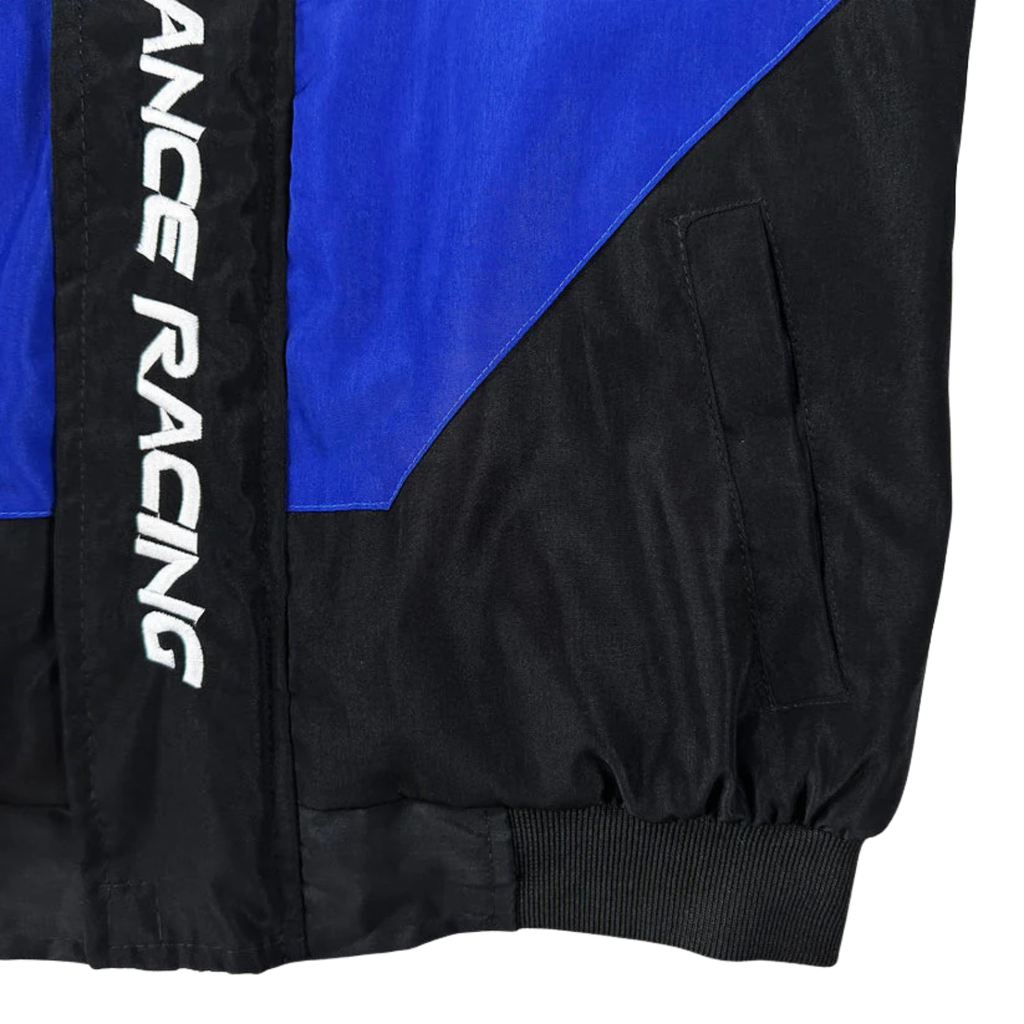 Blue and black racing jacket with 'ANCE RACING' text, motorsport apparel from revnhaus