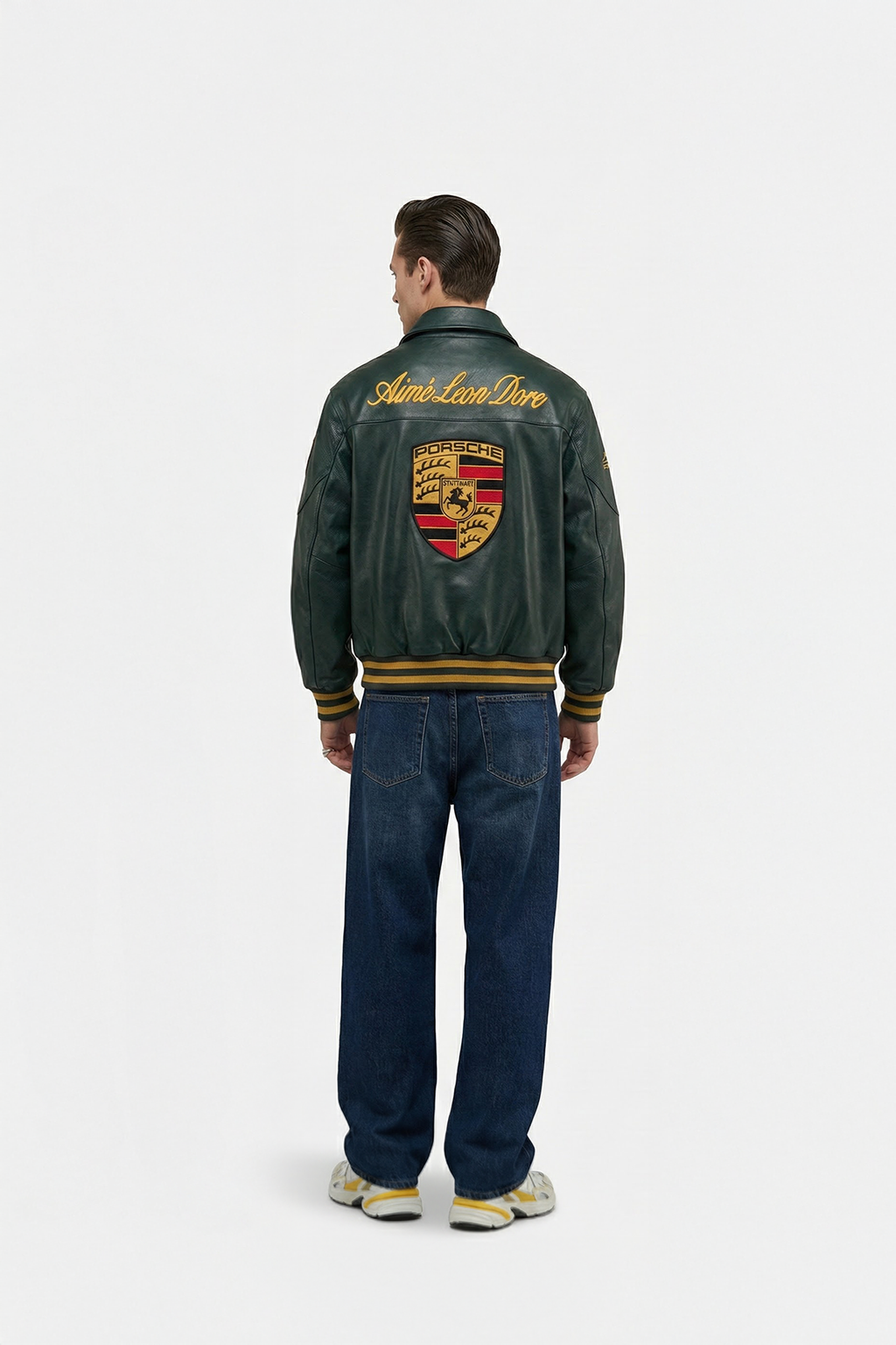 Green Porsche varsity jacket with embroidered crest and Aime Leon Dore branding from revnhaus