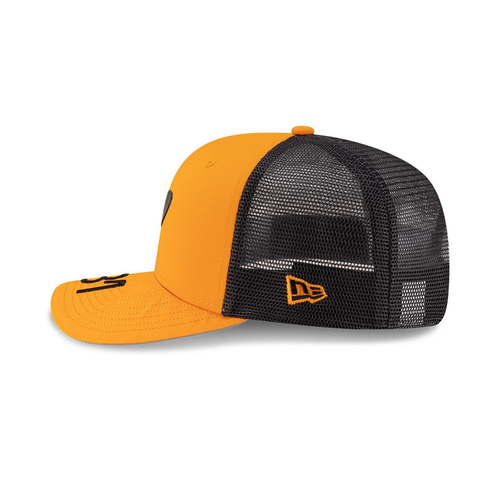 Yellow and black trucker hat with New Era logo, motorsport style from revnhaus