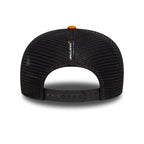Black McLaren mesh trucker hat with orange accent, adjustable strap, from revnhaus