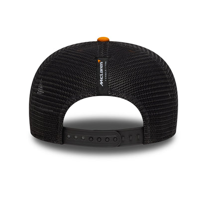 Black McLaren mesh trucker hat with orange accent, adjustable strap, from revnhaus