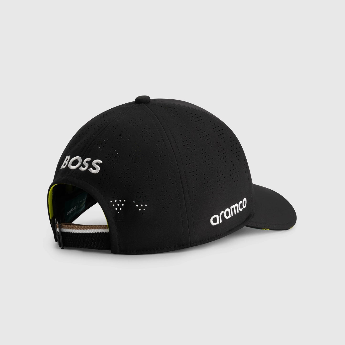 Black perforated racing cap with BOSS and aramco logos, motorsport apparel from revnhaus
