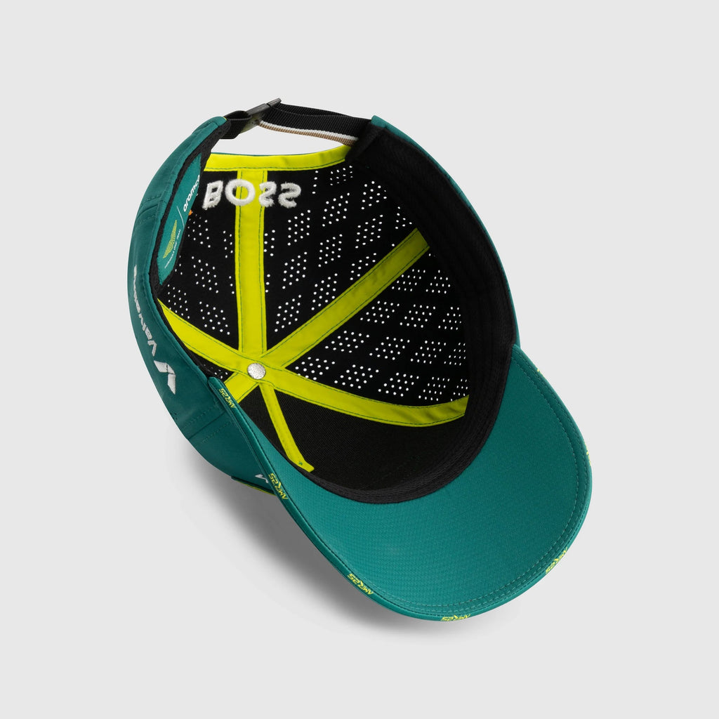 Green motorsport cap with yellow accents and 'BOSS' branding, from revnhaus