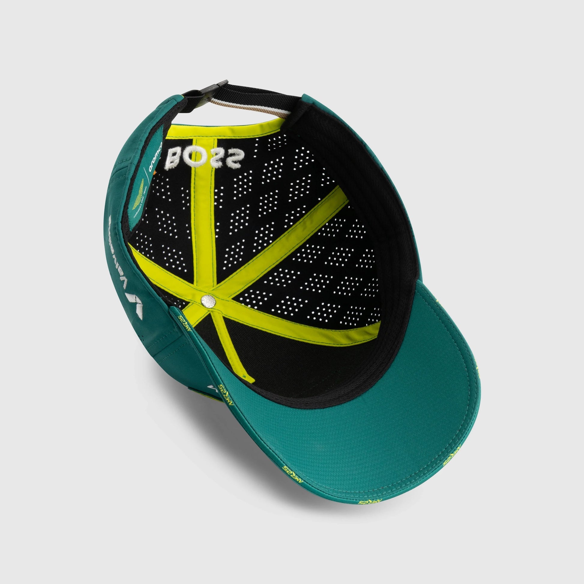 Green motorsport cap with yellow accents and 'BOSS' branding, from revnhaus