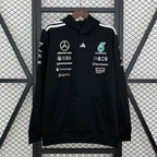 Black F1 team hoodie with sponsor logos, white stripes, and front pocket from revnhaus