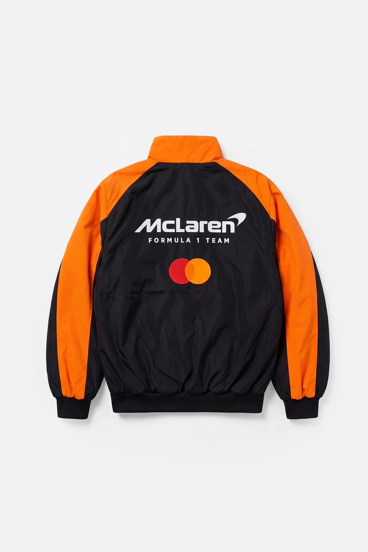 McLaren Formula 1 Team black and orange racing jacket with Mastercard logo from revnhaus
