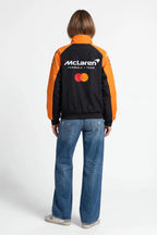 McLaren Formula 1 Team black and orange racing jacket with Mastercard logo from revnhaus