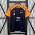 McLaren F1 team racing jersey with sponsor logos, orange and navy design from revnhaus