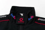 Black F1 racing jacket with FedEx, Vodafone, Bridgestone logos from revnhaus