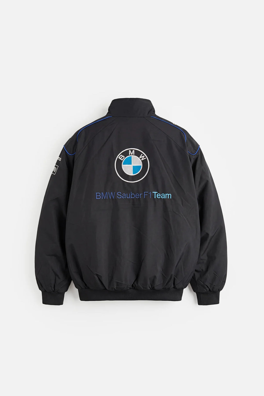 Black BMW Sauber F1 Team bomber jacket with blue accents from revnhaus