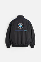 Black BMW Sauber F1 Team bomber jacket with blue accents from revnhaus
