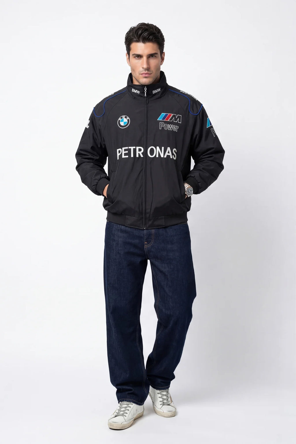 Men's BMW M Power Petronas racing jacket with blue accents, worn with jeans and sneakers from revnhaus