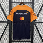 McLaren F1 Team racing t-shirt with Mastercard logo, orange and navy design from revnhaus
