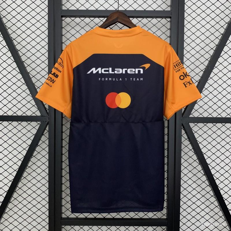 McLaren F1 Team racing t-shirt with Mastercard logo, orange and navy design from revnhaus