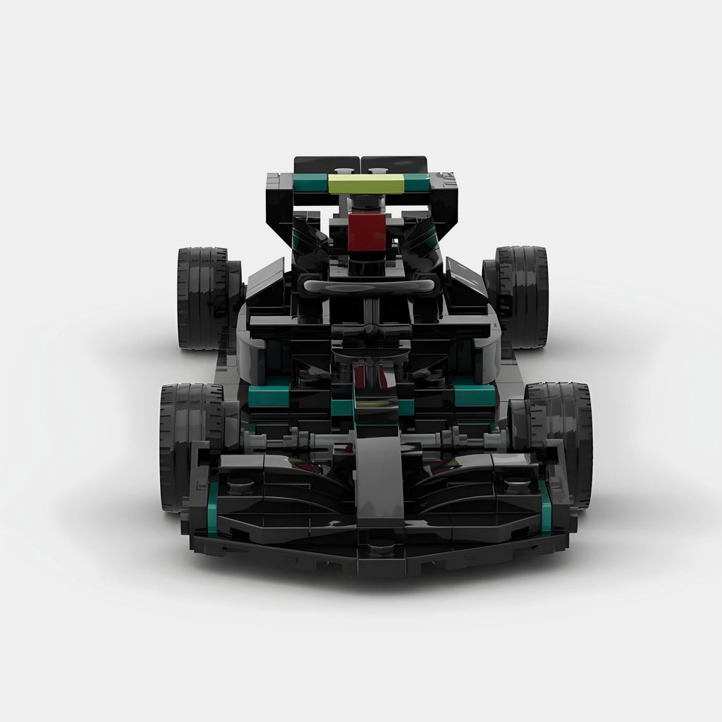 Black and teal F1-style LEGO race car with detailed aerodynamics from revnhaus