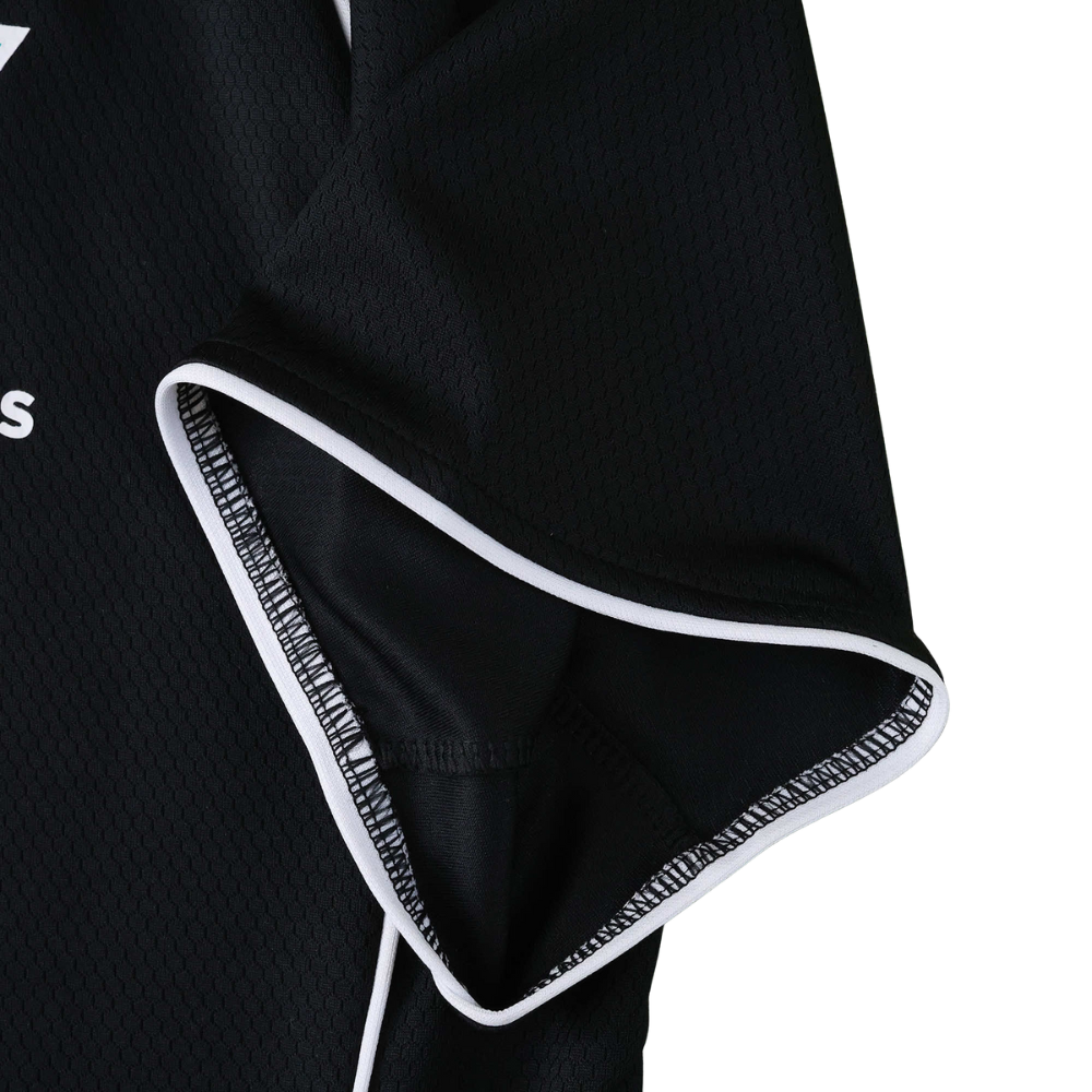 Black motorsport racing jacket with white trim and mesh fabric from revnhaus