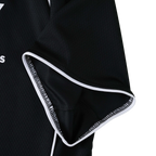 Black motorsport racing jacket with white trim and mesh fabric from revnhaus