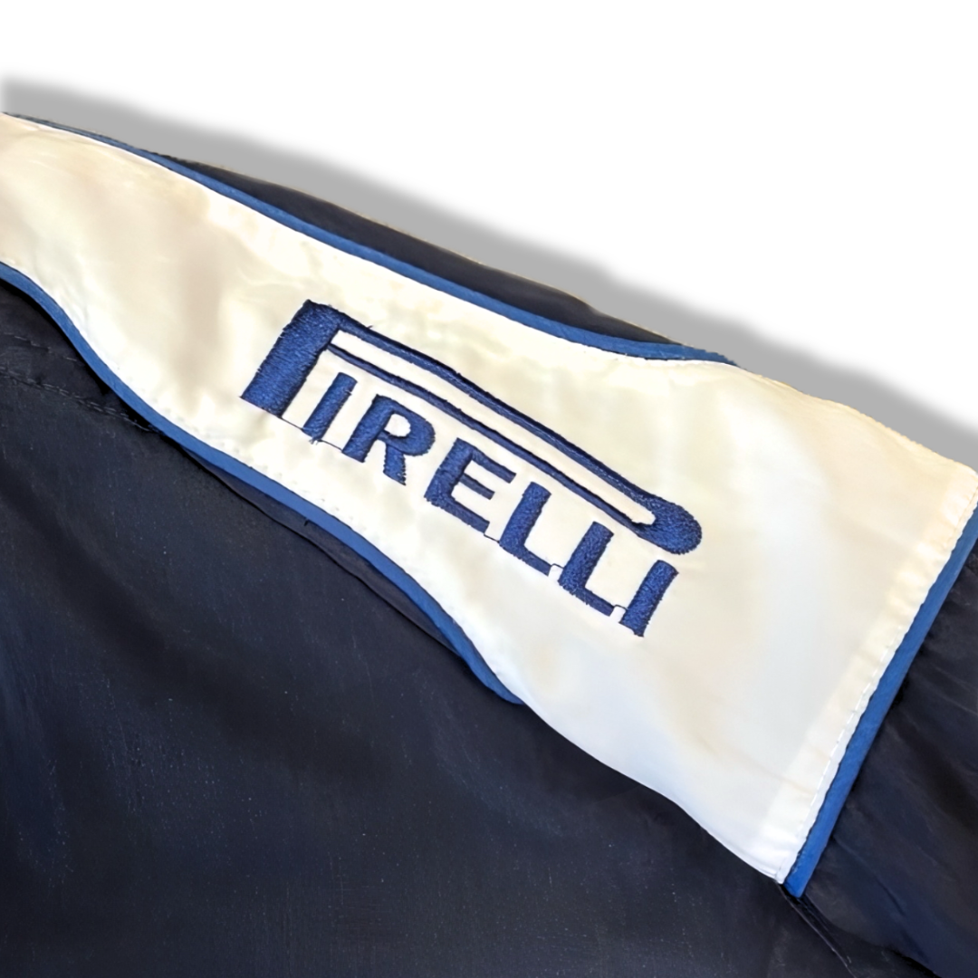 Pirelli embroidered logo on racing jacket sleeve, motorsport apparel from revnhaus