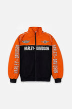 Orange and black Harley-Davidson racing jacket with bold branding and winged logos from revnhaus
