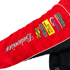 Red racing jacket sleeve with Budweiser, Sunoco, Bosch, and Freightliner patches from revnhaus