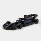 Blue and black LEGO-style F1 race car model with driver, from revnhaus