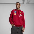 Red Ferrari F1 team hoodie with sponsor logos, motorsport apparel from revnhaus