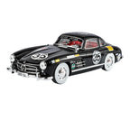 Black Mercedes 300 SL race car die-cast model with #35 Camel livery, white walls, from revnhaus