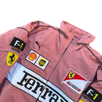 Pink Ferrari F1 racing jacket with Shell, UPS, and Scuderia patches from revnhaus