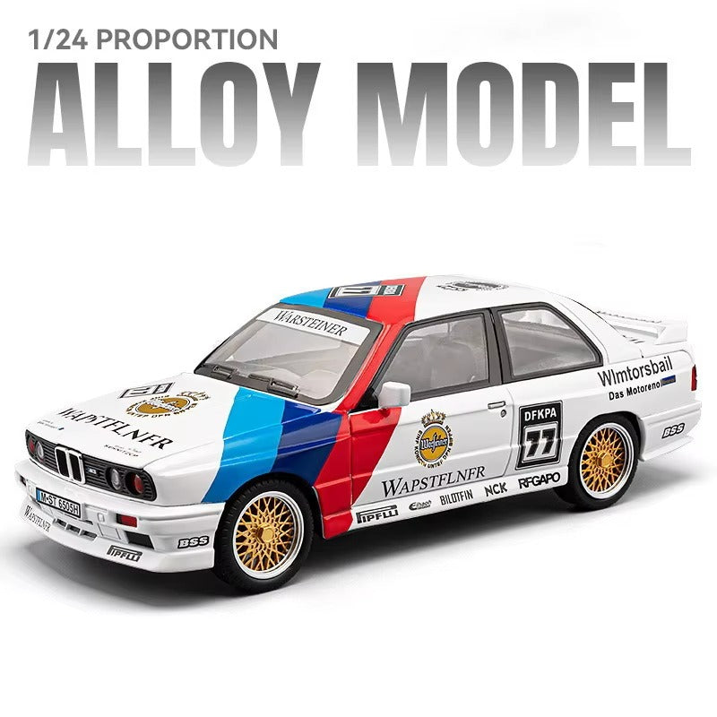 1/24 scale alloy BMW E30 M3 die-cast model with Warsteiner livery, gold wheels, from revnhaus