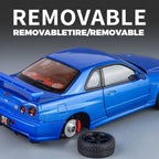 Blue Nissan GT-R die-cast model with removable tire, motorsport collectible from revnhaus