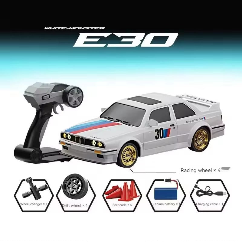 White Monster E30 RC drift car with remote, racing wheels, and accessories from revnhaus