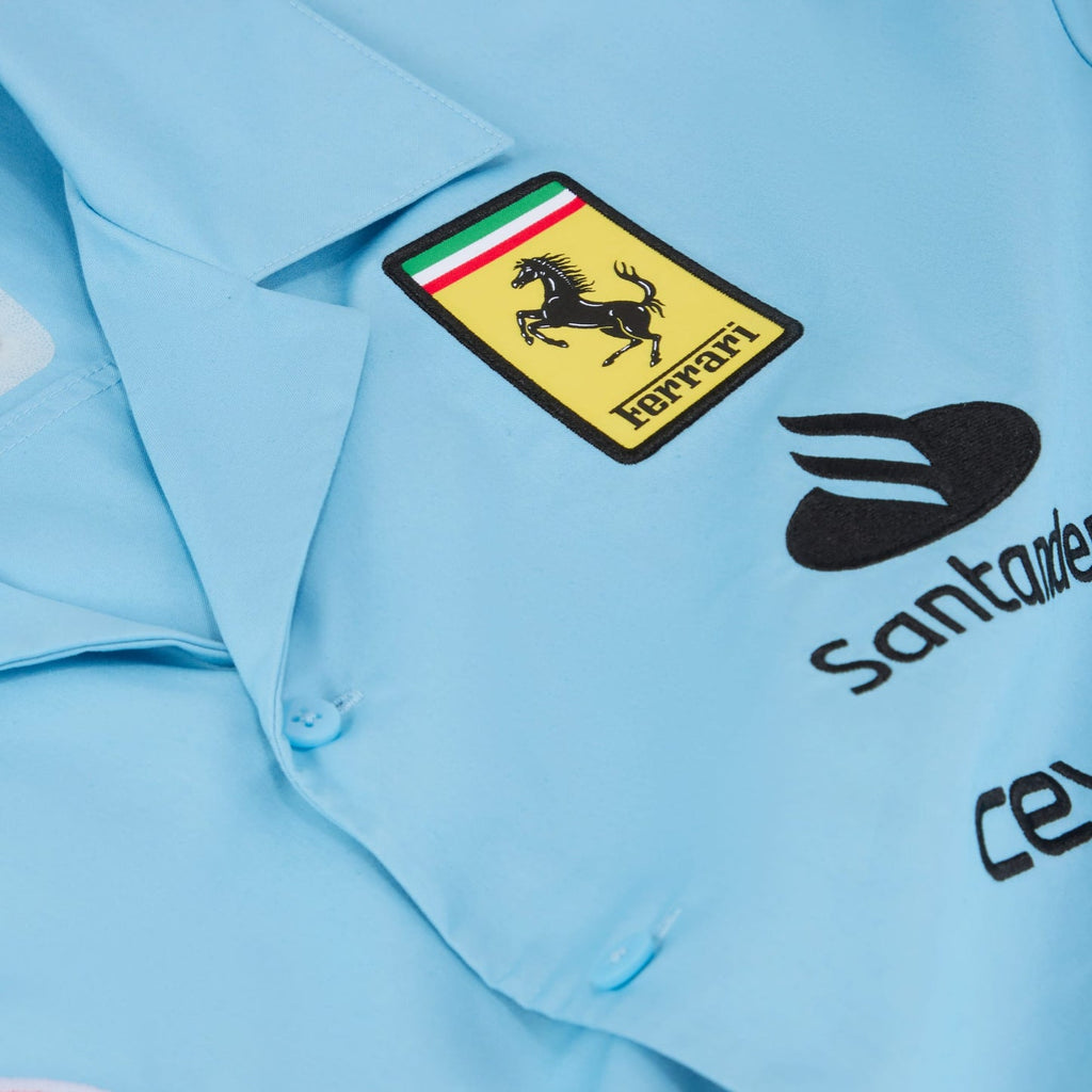 Light blue Ferrari racing shirt with prancing horse logo and Santander sponsor, from revnhaus