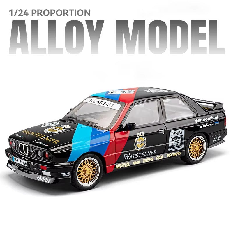1/24 scale alloy model BMW M3 race car with Warsteiner livery, gold wheels, from revnhaus