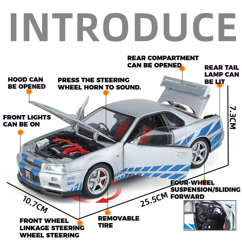 Silver RC drift car with blue stripes, open hood, working lights, and removable tires from revnhaus