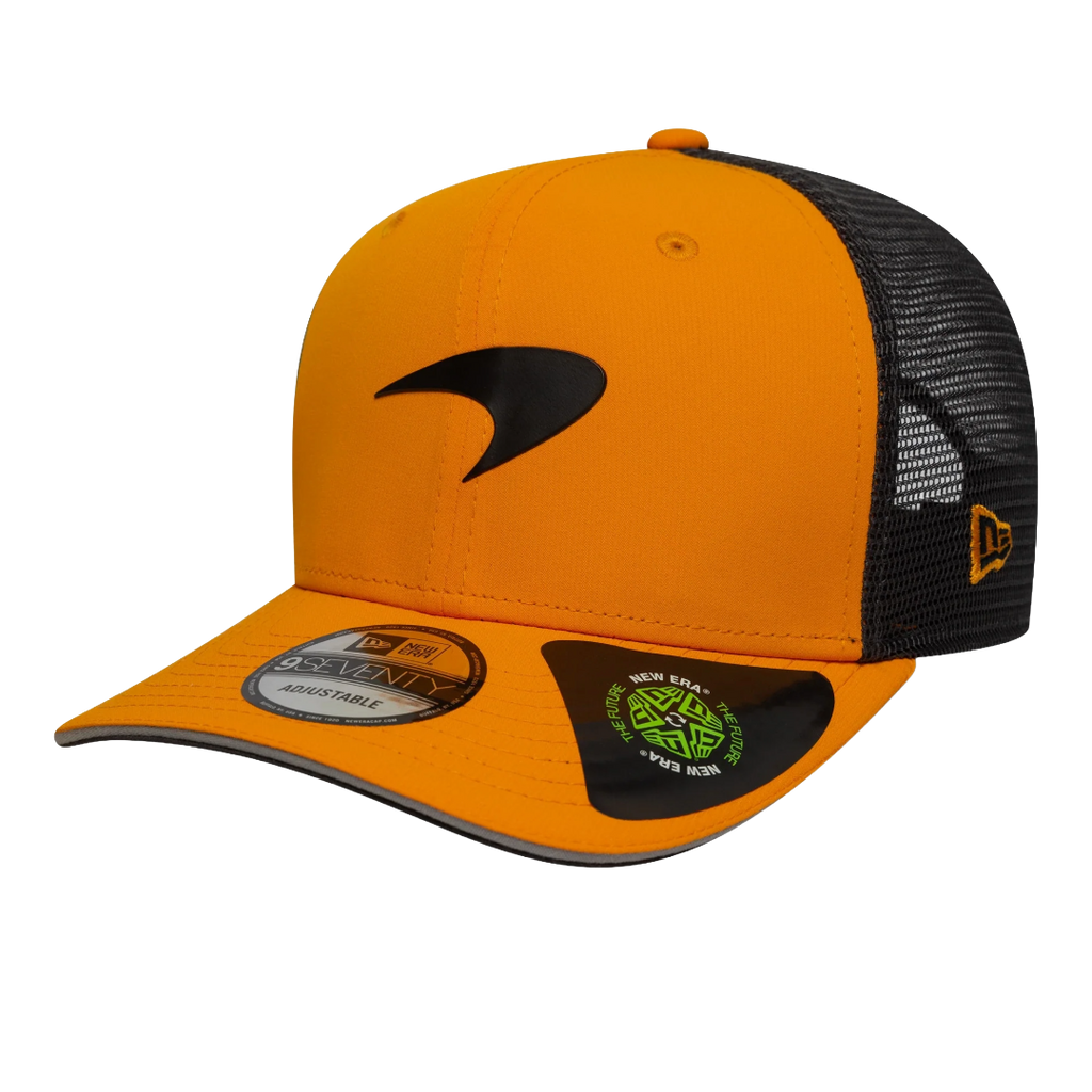 Orange and black New Era 9FIFTY trucker hat with sleek logo, adjustable fit, from revnhaus