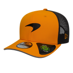 Orange and black New Era 9FIFTY trucker hat with sleek logo, adjustable fit, from revnhaus