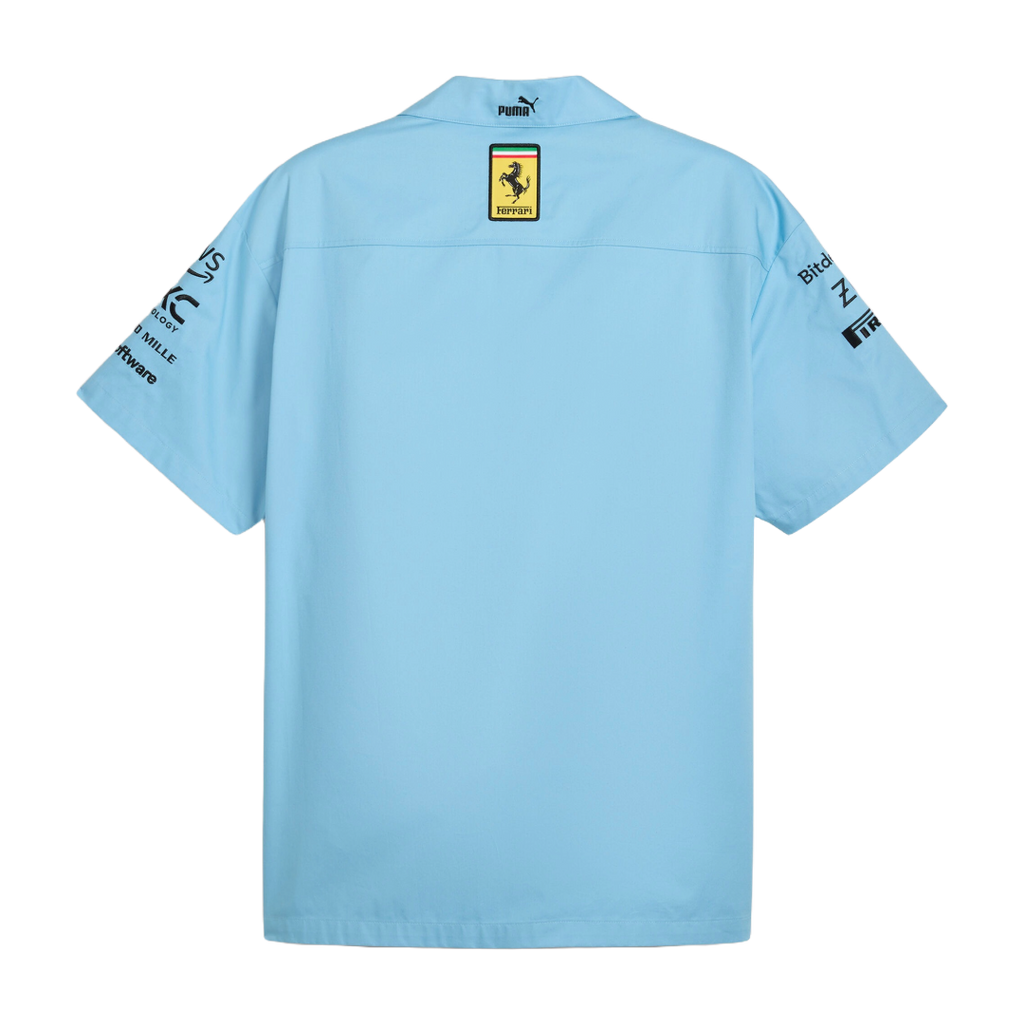 Light blue Puma Ferrari racing shirt with sponsor logos on sleeves from revnhaus