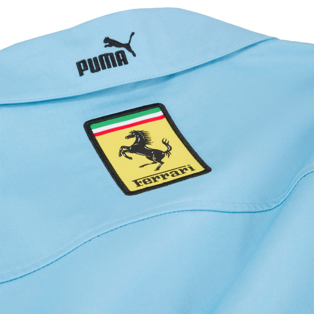 Light blue Puma Ferrari racing shirt with iconic prancing horse logo from revnhaus