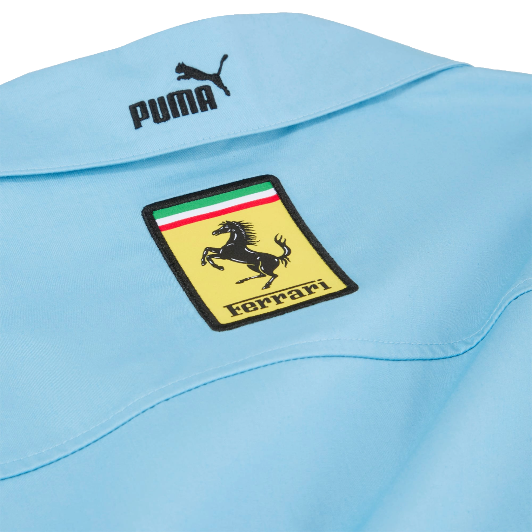 Light blue Puma Ferrari racing shirt with iconic prancing horse logo from revnhaus
