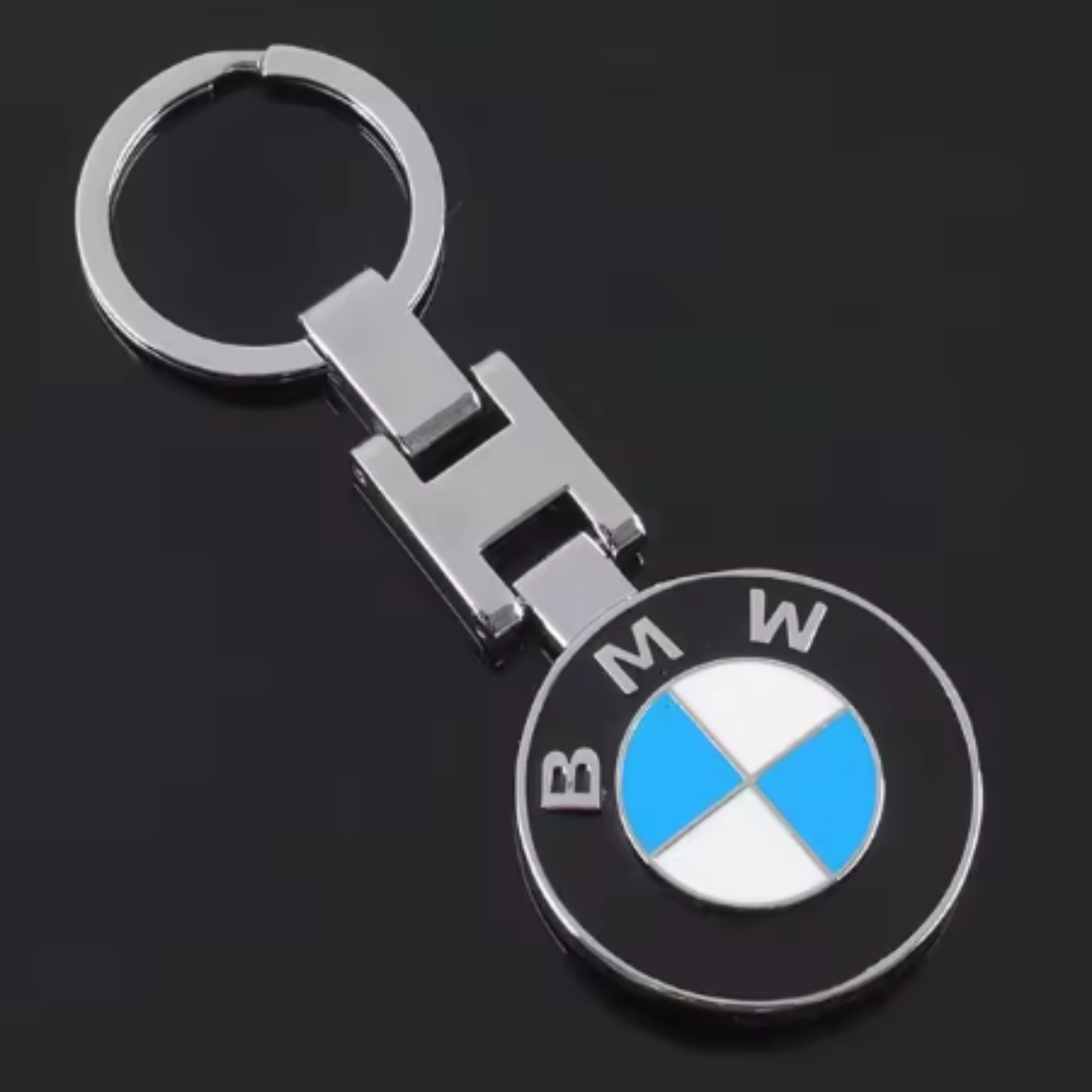 BMW logo keychain with blue and white emblem, chrome finish, from revnhaus